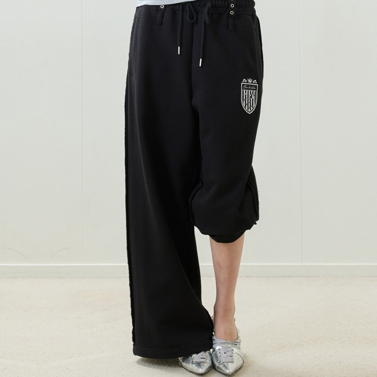 （韓国発送）EL STAR EMBLEM TRAINING PANTS (BLACK)